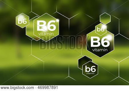 Molecular Model Of Vitamin B6. Hexagons With Vitamin B6 Name, Blurry Background.