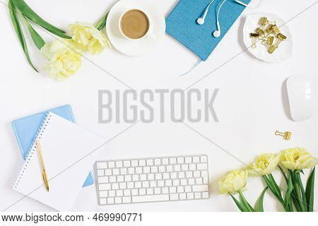 The Workspace Of An Office Desk On A White Background. The Location Of A Female Workplace At An Offi