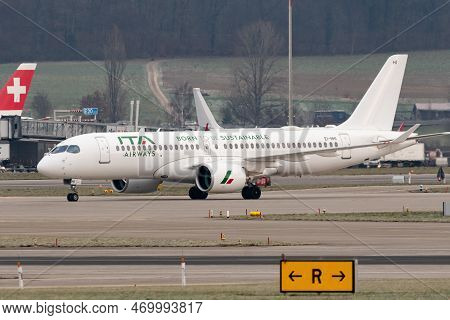 Zurich, Switzerland, January 20, 2023 Ita Airways Bombardier Cs-300 Or A220 Aircraft Is Taxiing To I