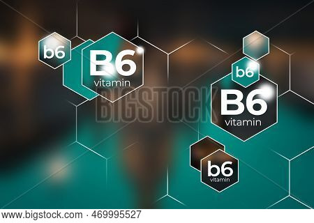 Molecular Model Of Vitamin B6. Hexagons With Vitamin B6 Name, Blurry Background.