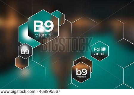 Molecular Model Of Vitamin B9. Hexagons With Vitamin B9 Name, Blurry Background.