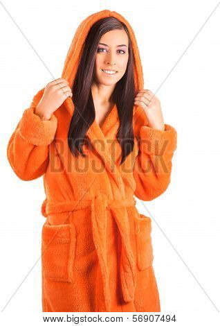 cute brunette in an orange bathrobe