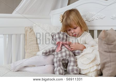 Sad Girl With Toy Bear.
