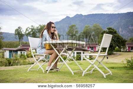 Young woman talking on a mobile