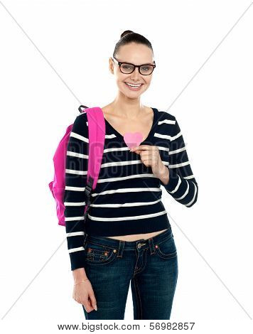 College Student Holding Heart Symbol
