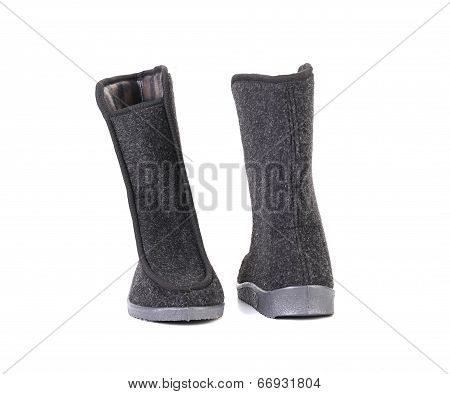 Black felt boots.