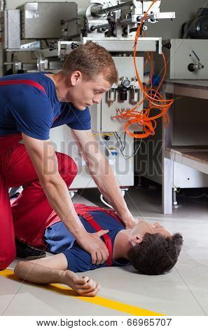 Unconscious Man After Accident In Factory