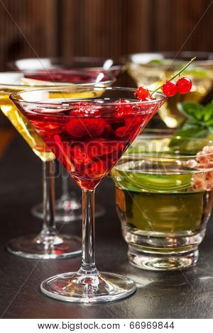 Party cocktails and longdrinks garnished with fruits for summer