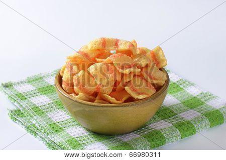 bowl of puffed crisp snacks