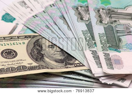 Hundred dollars and to one thousand rouble banknotes