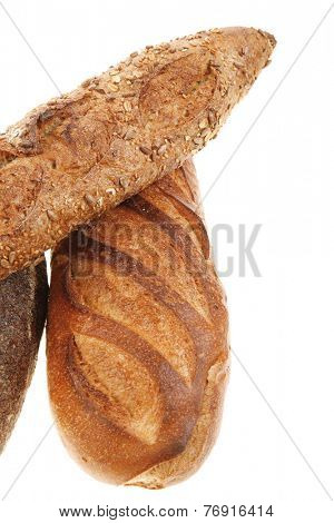 different rye and white flour bread loaf with french baguette isolated on white background