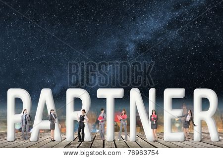 Concept of partner, friends,collaborate with group of business people stand with 3d text. 