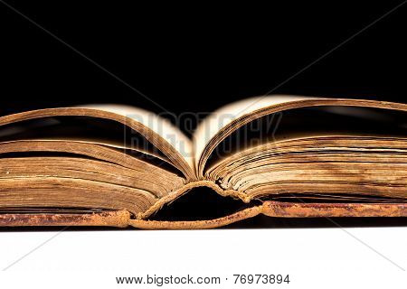 Ancient Book Shot On Black Background