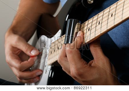 Electric Guitar Player Performing Song
