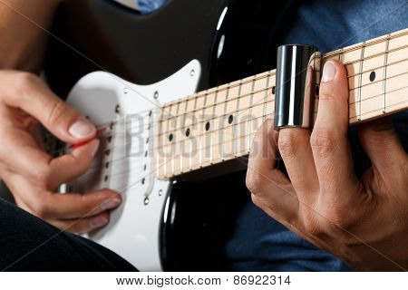 Electric Guitar Player Performing Song