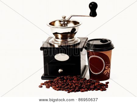 Coffee Grinder, Coffee Beans And Coffee Cup