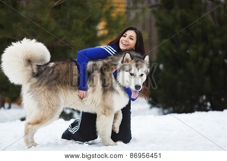 Woman With Malamutes