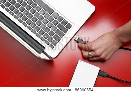 External hard drive connected to laptop