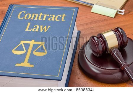 A Law Book With A Gavel - Contract Law