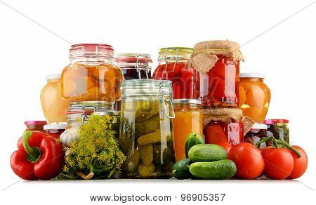 Jars With Pickled Vegetables And Fruity Compotes On White