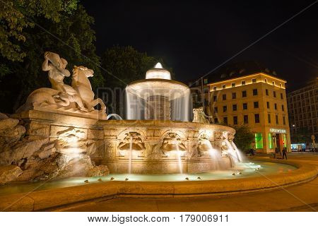The Famous Fountain Wittelsbach At Night. Munich, Bavaria, Germany.