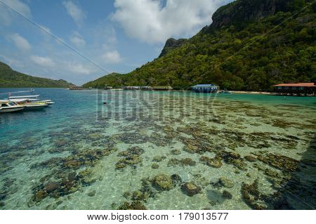 Beautiful tropical Bohey Dulang island with beach and blue water for relax