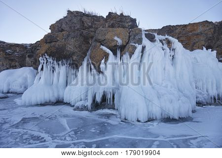 Icicles In Oltrek Island. Baikal. Winter Landscape