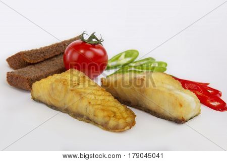 Dishes from sturgeon. Cooked sturgeon. Steak from sturgeon.