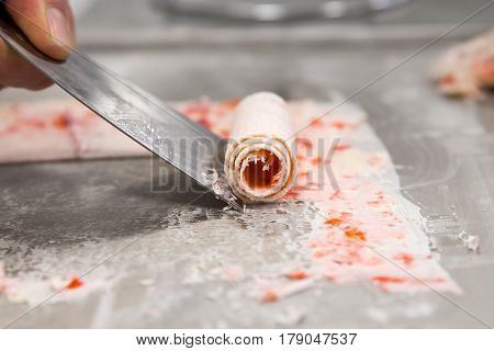 Detail Of Strawberry Rolled Ice Cream On Cold Plate.