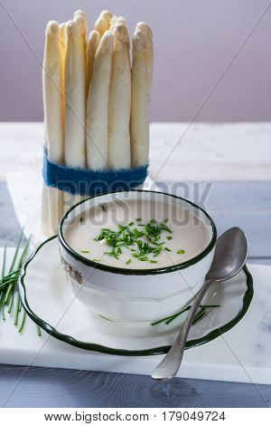 Spring season - white and green asparagus cream- soup ready to eat