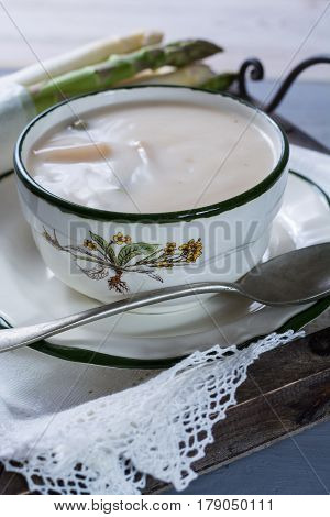 Spring season - white and green asparagus cream- soup ready to eat