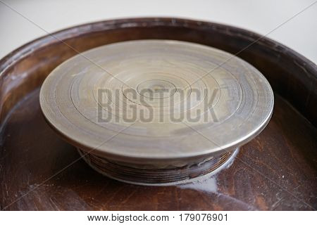 Closeup image of empty pottery wheel ready for use