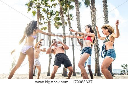 Multi-ethic group of people having fun on the beach