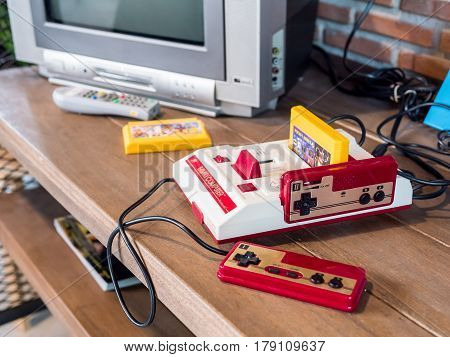 Chonburi Thailand - March 25 2017: Nintendo family computer the video game console for home or portable gaming.