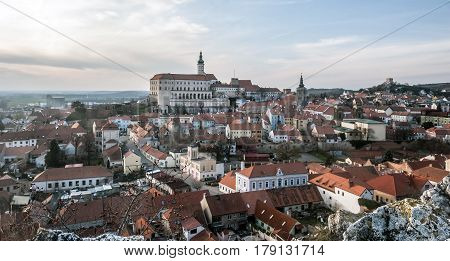 panorama of historical Mikulov city with chateau and ruins of Kozi hradek castle from Olivetska hora hill in southernmost part of Pavlovske vrchy mountains in South Moravia