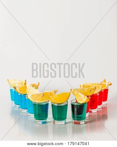 Eleven Color Shot Drinks, Red, Blue And Green Kamikaze, Quarters Of Lemon