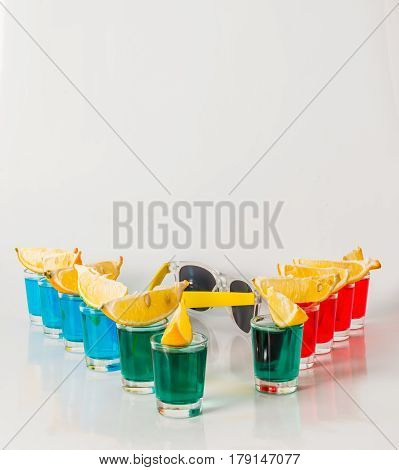Eleven Color Shot Drinks, Red, Blue And Green Kamikaze, Quarters Of Lemon, Sunglasses