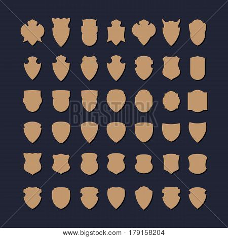 Set of vintage vector badge shapes, collection of decoration design elements for creating retro logos, the template labels for fashion clothes from leather and jeans, denim.