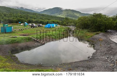 Kamchatka Peninsula, Russia - August 24, 2016: Malkinskie thermal mineral hot springs in Kamchatka