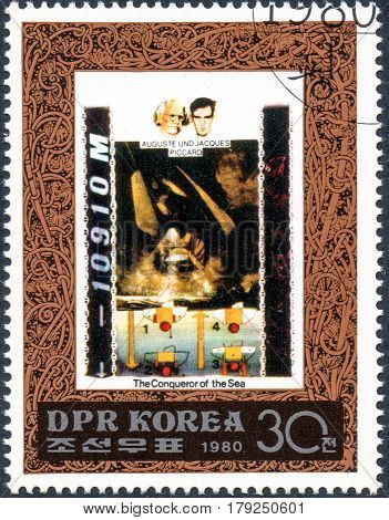 UKRAINE - CIRCA 2017: A postage stamp printed in DPR North Korea shows Auguste and Jacques Piccard serie The Conqueror of the Sea circa 1980