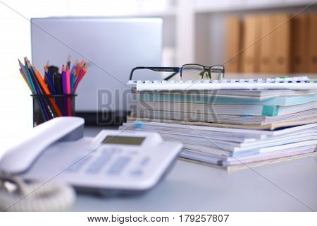 Group Of Multicolored Office Folders And Glasses