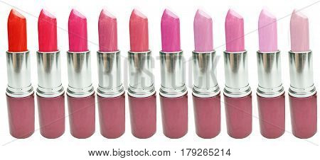 bright lipstick collection cosmetic set on white background