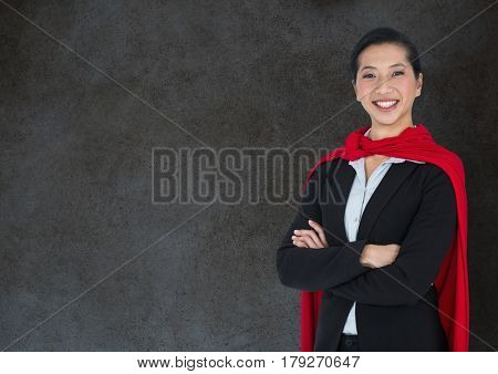Digital composite of Business Superhero against stone wall