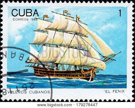 UKRAINE - CIRCA 2017: A postage stamp printed in Cuba shows sailing ship El Fenix from the series Cuban sailboats circa 1989