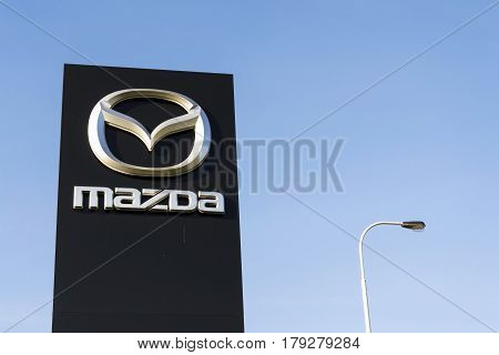 Prague, Czech Republic - March 31: Mazda Car Company Logo In Front Of Dealership Building On March 3