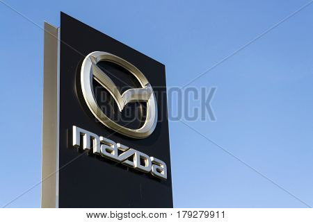 Prague, Czech Republic - March 31: Mazda Car Company Logo In Front Of Dealership Building On March 3