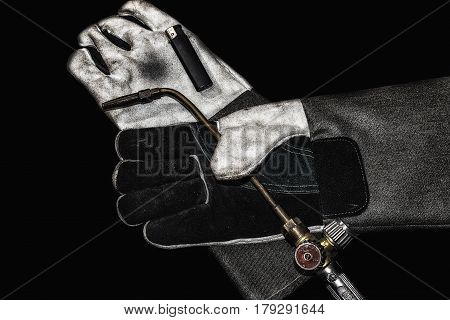 Heat resistant gloves for welding of plastic pipes isolated on a white background. Used to install plumbing and heating pipes made of polypropylene