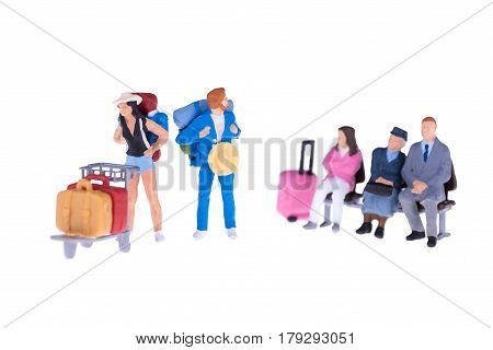 Close Up Of Miniature Businessman And Tourist People Isolate On White Background. Elegant Design Wit