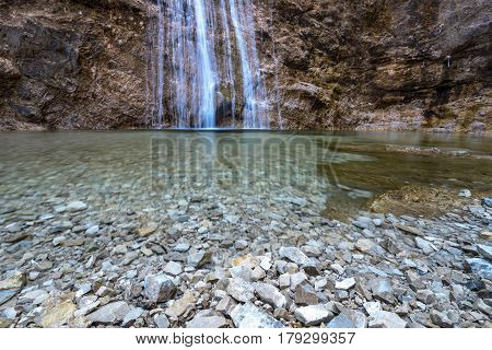 the high Nixenfall Waterfall in the Austrian Alps