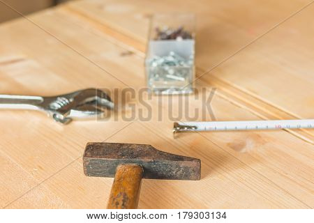 Set Of Tools On A Workbench With Nails